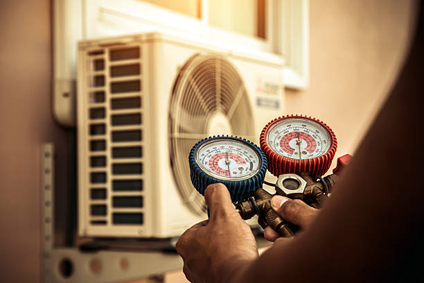 Professional Hvac technician working in Royal Palm Beach, FL
